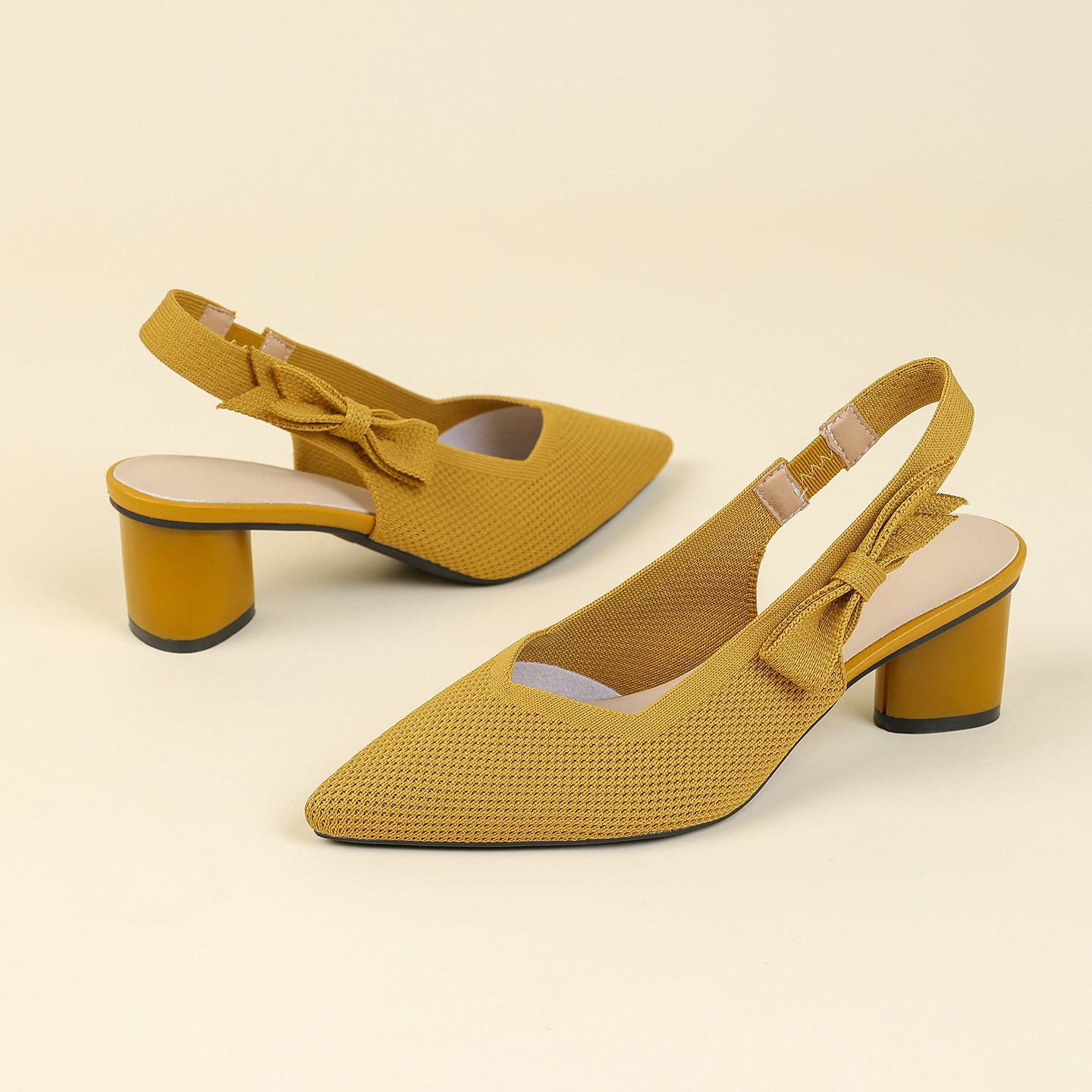 上品な尖頭デザインの後ろリボン付き太ヒールサンダル